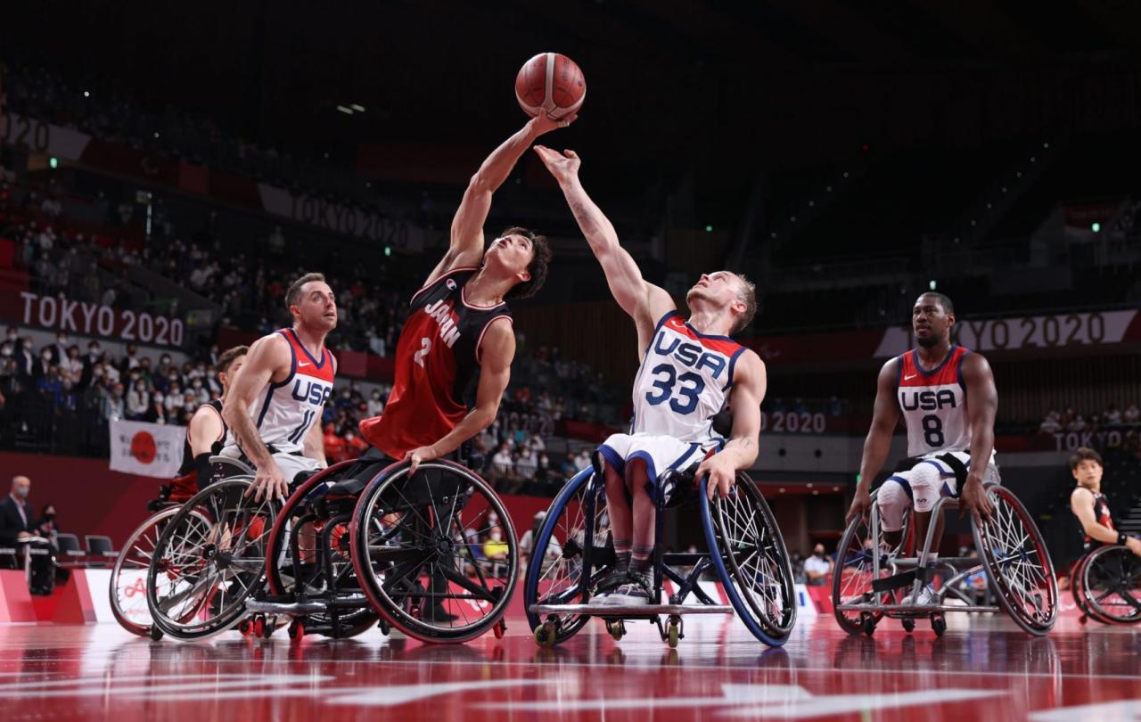 Wheelchair jake paralympic baloncesto silla ruedas williams ball defend medals atletas deportiva uli